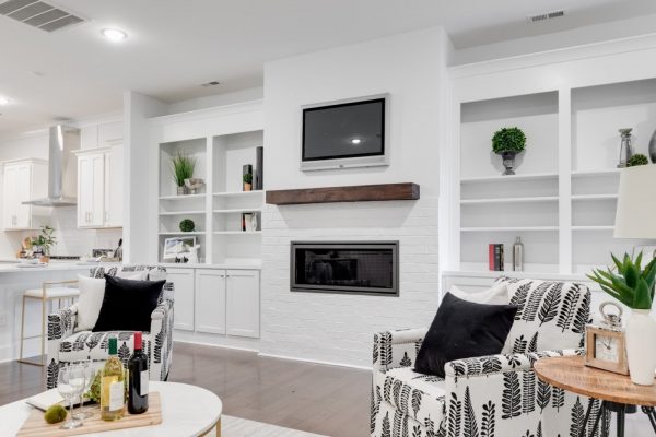 Beautiful family room with built-in shelving in new townhouse by Richmond Hill Design-Build