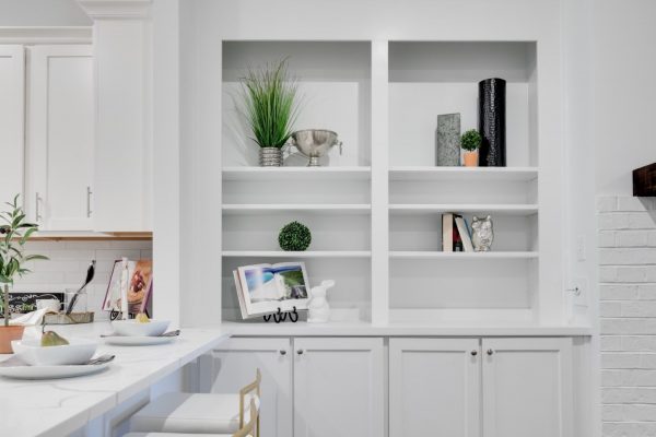 Built in shelving in family room of new townhouse by Richmond Hill Design-Build