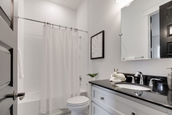 Guest bathroom in beautiful new townhouse by Richmond Hill Design-Build