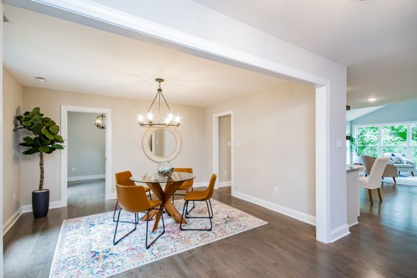 Dining room of renovated ranch home on Lake Cherokee by Richmond Hill Design-Build