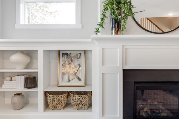 Built-ins by fireplace in family room of new home built by Richmond Hill Design-Build