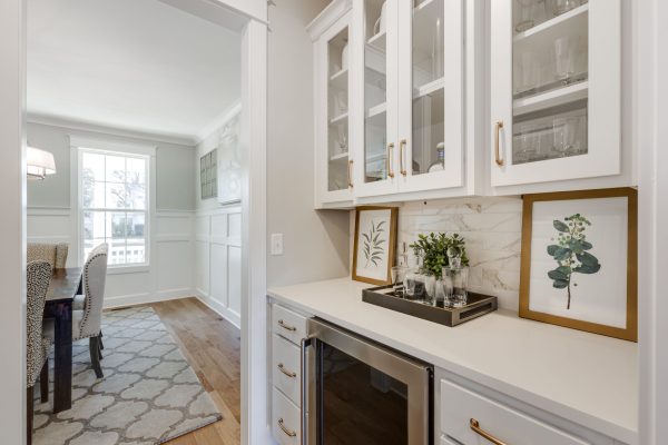 Butler's pantry with wine fridge in new home built by Richmond Hill Design-Build