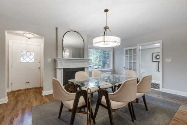 Dining area in beautifully renovated Tudor home by Richmond Hill Design-Build