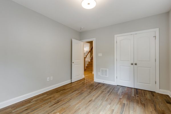 First floor bedroom in renovated home by Richmond Hill Design-Build