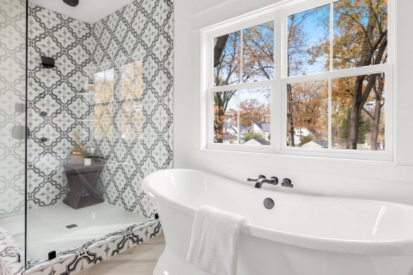 Primary bathroom with freestanding tub in new home by Richmond Hill Design-Build