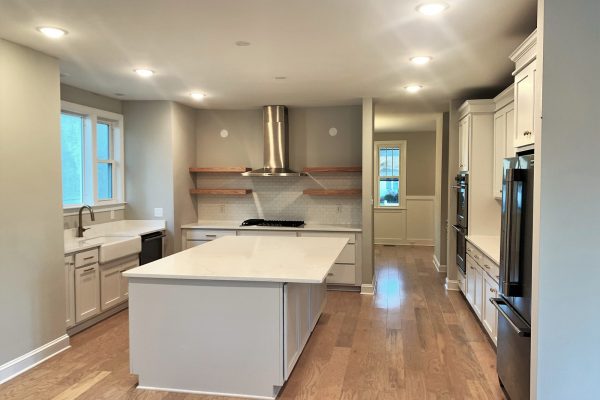 Beautiful kitchen with island in renovated home by Richmond Hill Design-Build