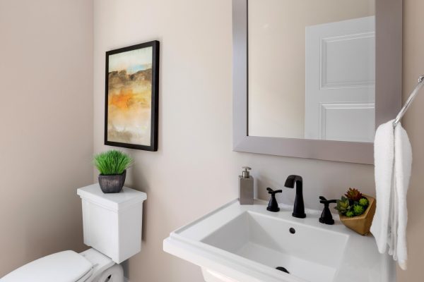 Powder room of beautiful remodeled home by Richmond Hill Design-Build