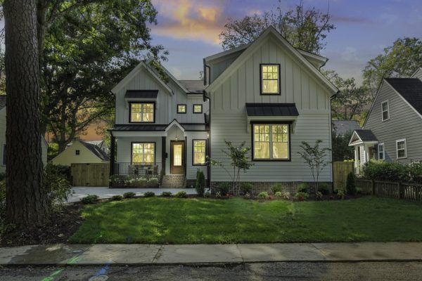 Twilight photo of stunning exterior of new home by Richmond Hill Design-Build