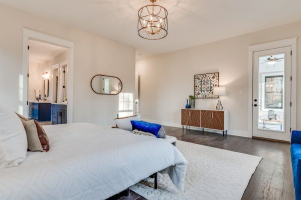 Primary bedroom on first floor of new home built by Richmond Hill Design-Build