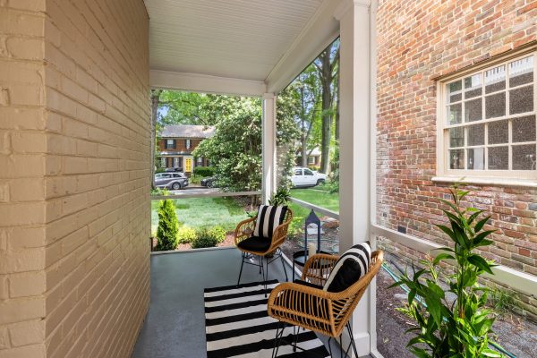 Screened in porch of remodeled home by Richmond Hill Design-Build