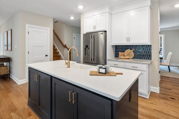 Island in kitchen of remodeled home by Richmond Hill Design-Build