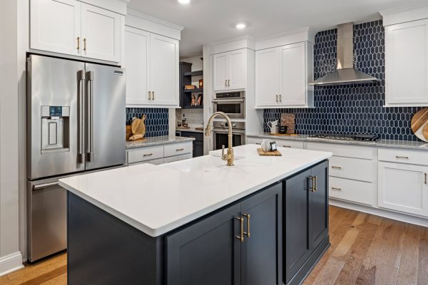 Island in kitchen of remodeled home by Richmond Hill Design-Build