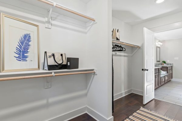 Closet in primary bedroom of new build by Richmond Hill Design-Build