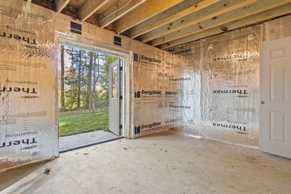 Unfinished storage area on ground floor of new build by Richmond Hill Design-Build