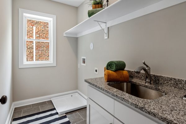 Laundry room of remodeled home by Richmond Hill Design-Build