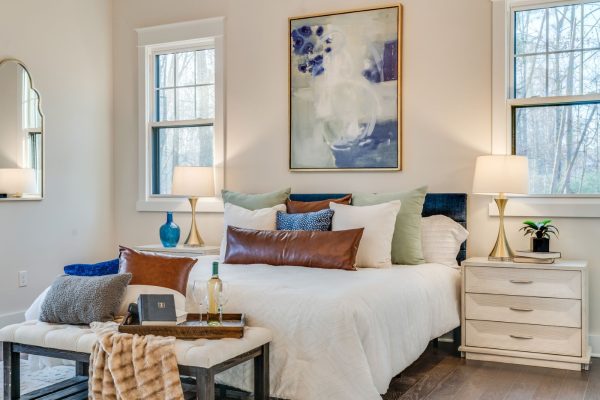 Primary bedroom on first floor of new home built by Richmond Hill Design-Build