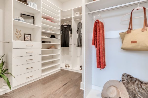 Closet in primary bedroom on first floor of new home built by Richmond Hill Design-Build
