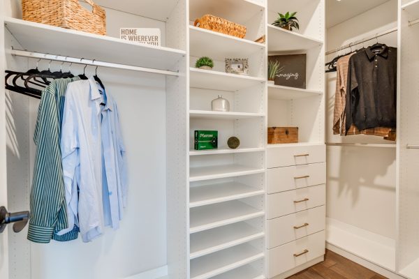 Closet in primary bedroom on first floor of new home built by Richmond Hill Design-Build