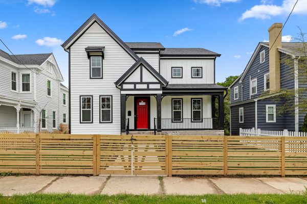 Front elevation with fence of new home built by Richmond Hill Design-Build