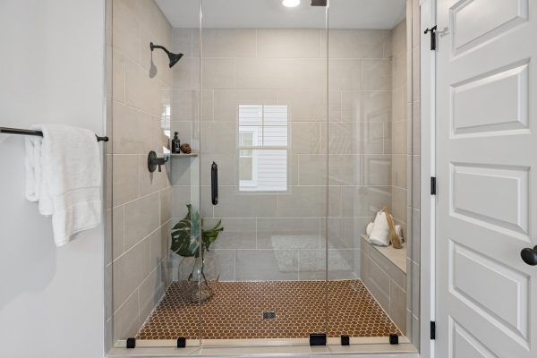 Shower in primary bathroom in new home built by Richmond Hill Design-Build