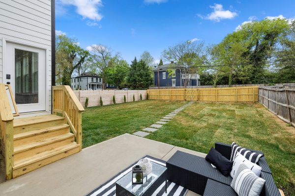 Rear patio and yard of new home built by Richmond Hill Design-Build