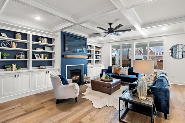 Beautiful family room with fireplace in remodeled home by Richmond Hill Design-Build