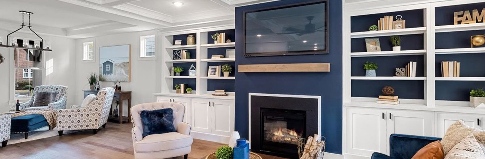 Beautiful family room with fireplace in remodeled home by Richmond Hill Design-Build