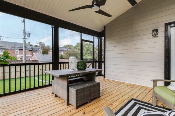 Screened-in porch in new home by Richmond Hill Design-Build