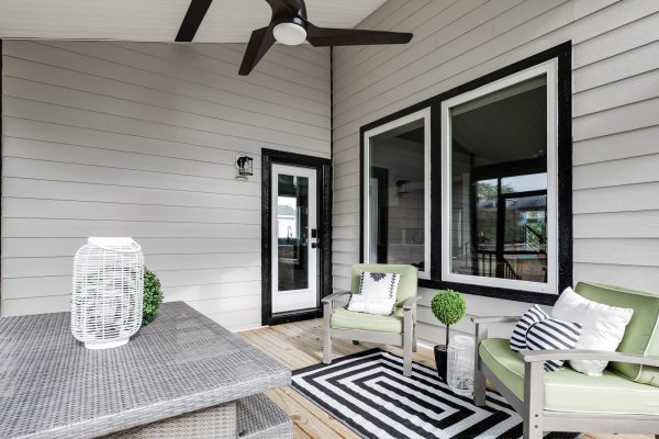 Rear screened-in porch of new home by Richmond Hill Design-Build