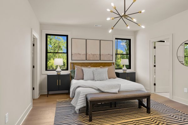 Primary bedroom in stunning new home built by Richmond Hill Design-Build