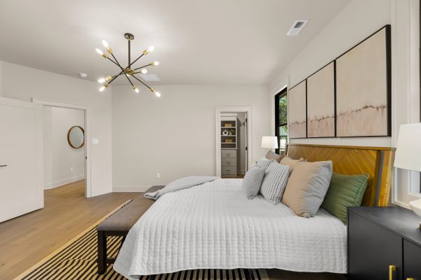 Primary bedroom in stunning new home built by Richmond Hill Design-Build