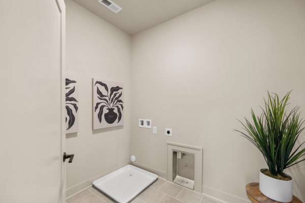 Laundry room in stunning new home built by Richmond Hill Design-Build