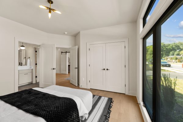 Secondary bedroom of stunning new home built by Richmond Hill Design-Build